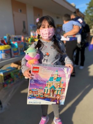 Spark of Love girl with a Lego